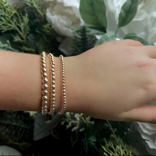 Gold Beaded Stretch Bracelets The Cole Collection