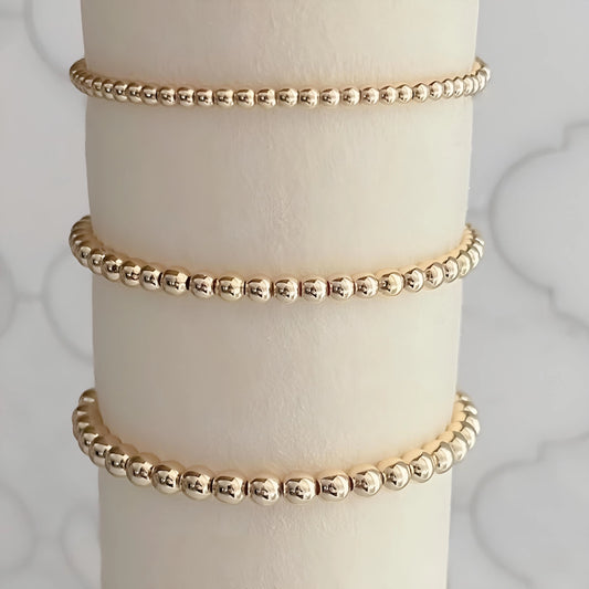 Gold Beaded Stretch Bracelets The Cole Collection