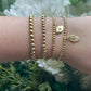 Gold Evil Eye Charm Bracelets The Cole Collection