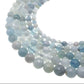 White Cross & Aquamarine Beaded Bracelet The Cole Collection